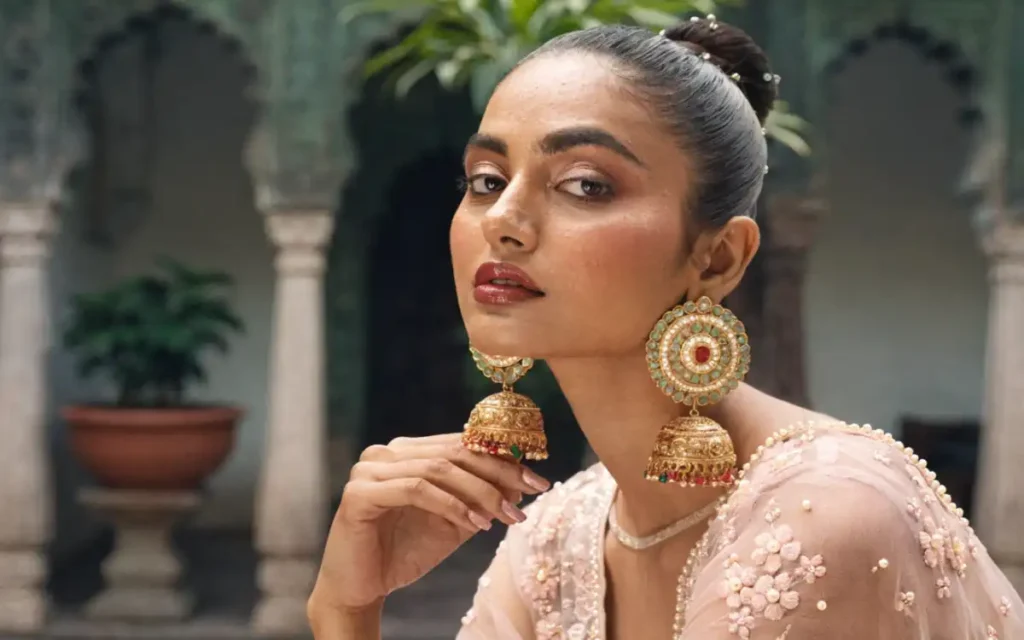 gold jhumka designs from tanishq